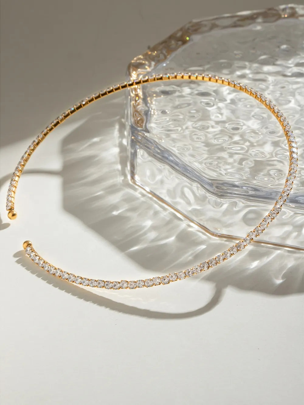 Gold collar necklace with full diamond row and ball ends