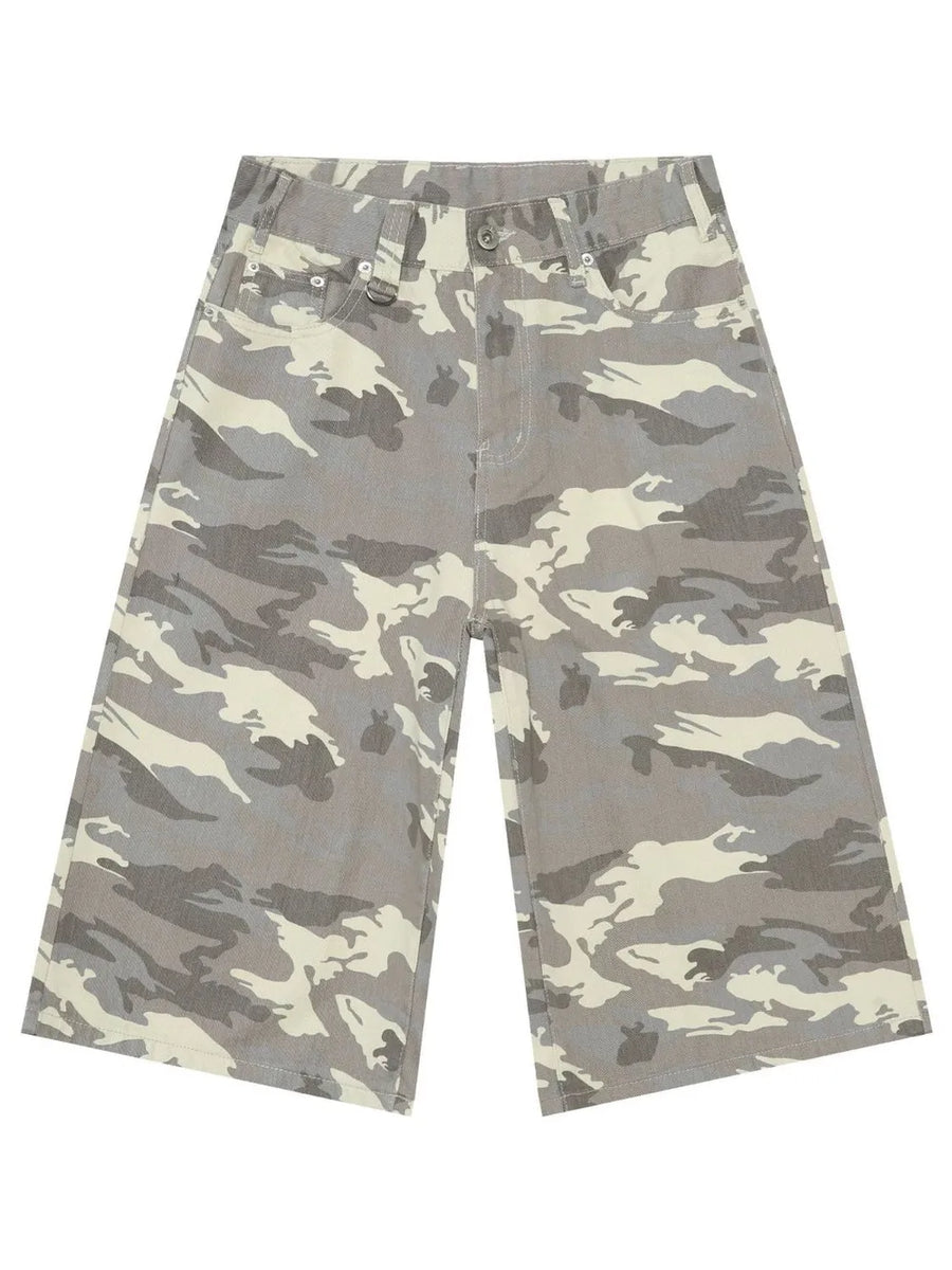 Wide-leg denim culottes in gray camouflage pattern with distressed details.