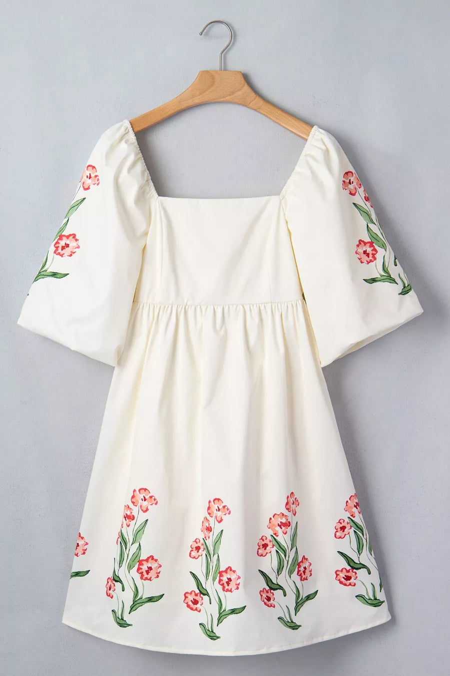 Cream floral puff sleeve square neck A-line dress with embroidered flowers.