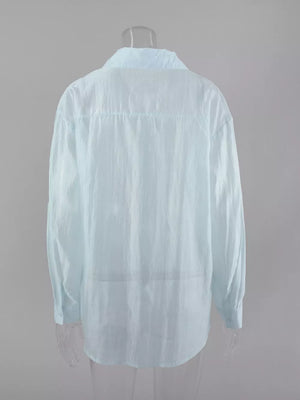 button-up shirt in light green with collared and long sleeve