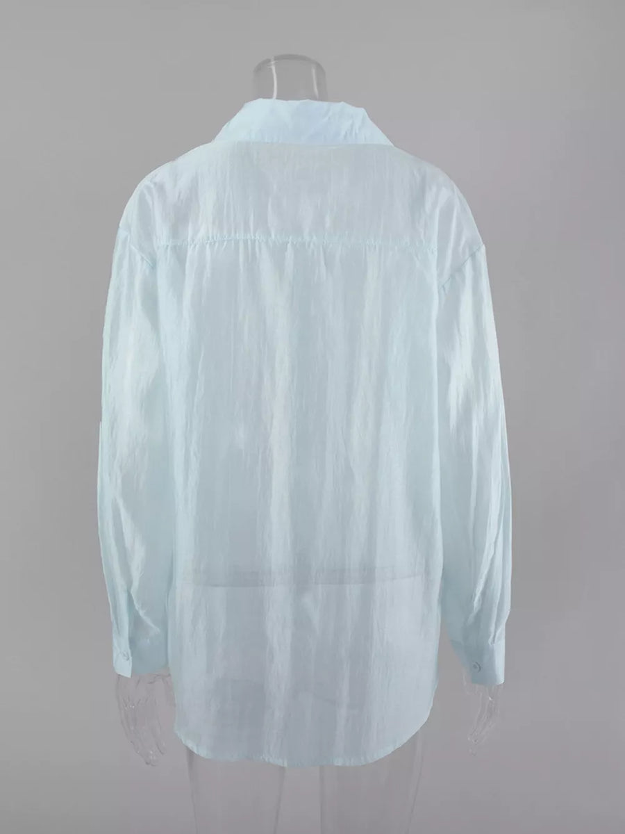button-up shirt in light green with collared and long sleeve