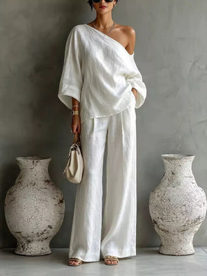 two-piece set in white featuring pocketed and relaxed fit