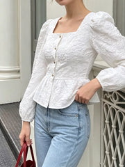 white peplum top with textured and square neck