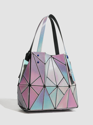 light blue handbag featuring iridescent finish and geometric