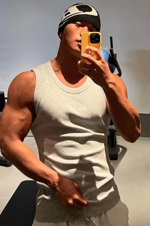 Gray ribbed cotton muscle tank top with a crew neck.