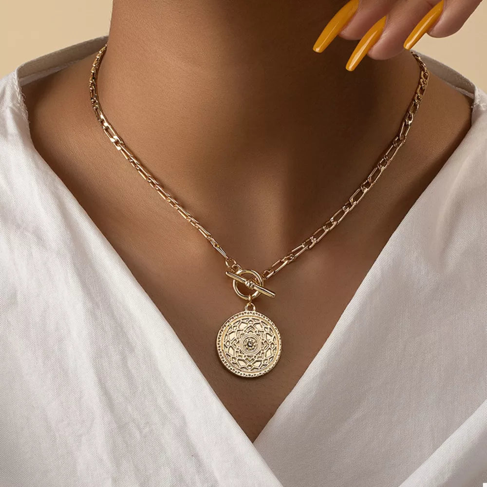 gold necklace with geometric and not applicable