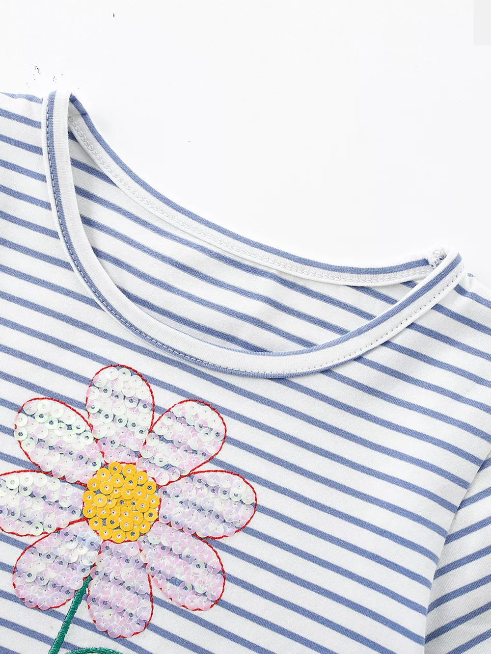 Baby dress with blue stripes and a sequin flower applique.
