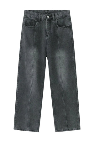 Dark wash denim jeans with vertical seam detail and straight leg cut.