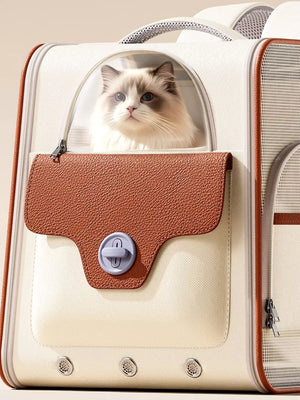 Chic two-tone pet carrier backpack in cream and brown with a cat peeking out.