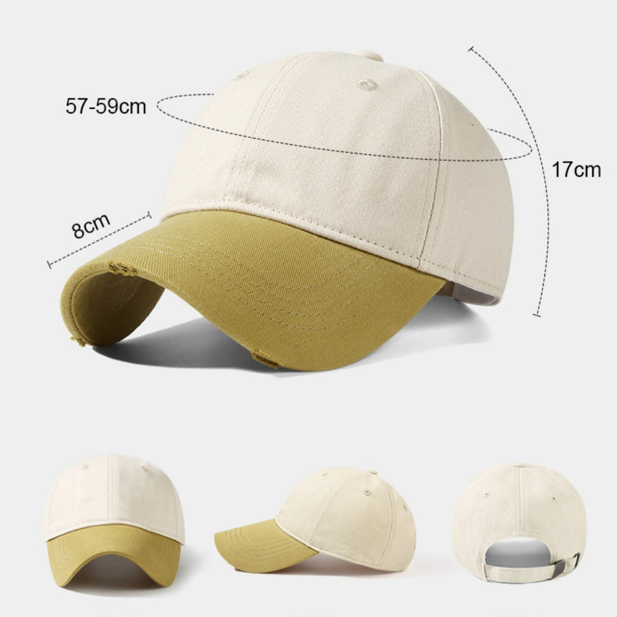 Distressed two-tone baseball cap in tan and khaki cotton with curved brim.