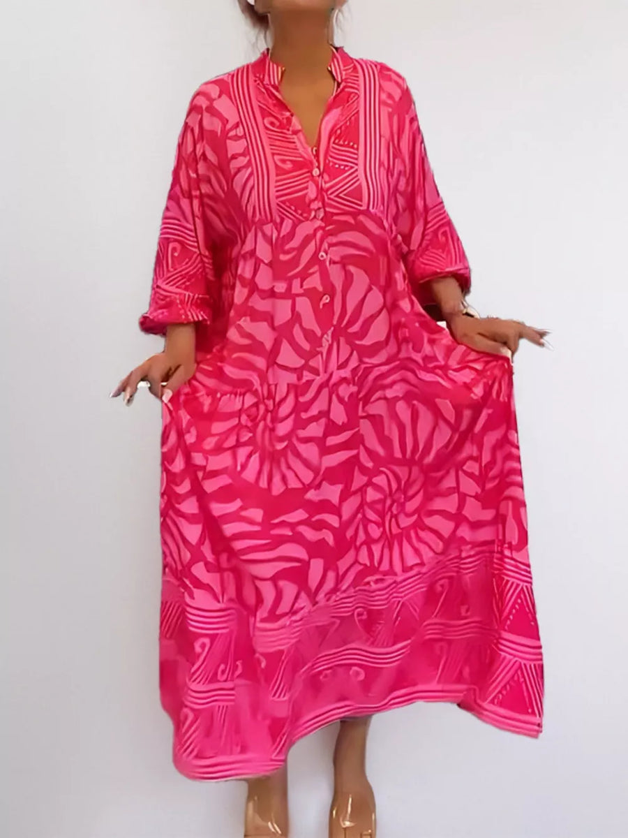 Hot Pink abstract print midi dress with button front and tiered skirt.