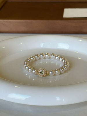 bracelet in Gold with floral and pearl beads