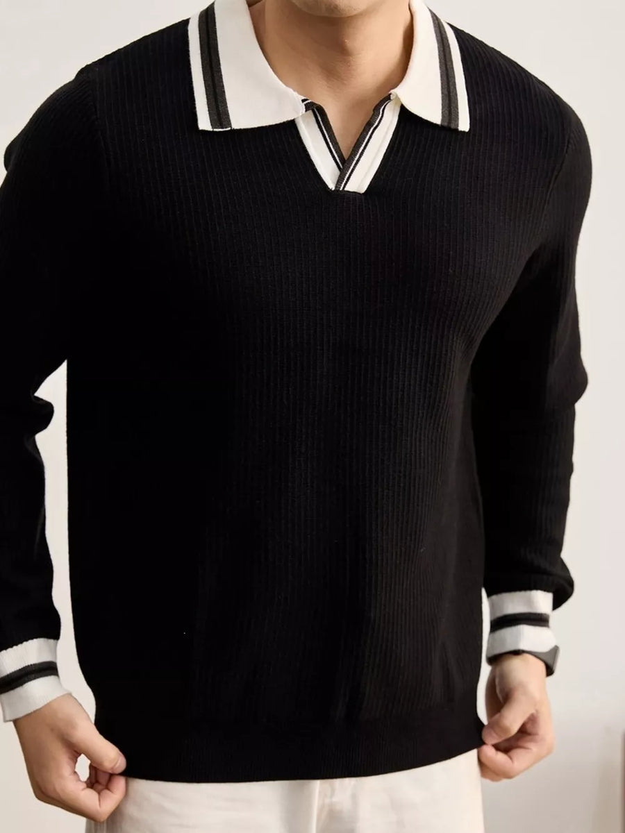 Navy pullover sweater featuring ribbed and ribbed