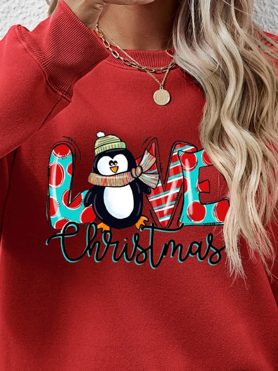 Red sweatshirt with festive penguin graphic and "Christmas" text.