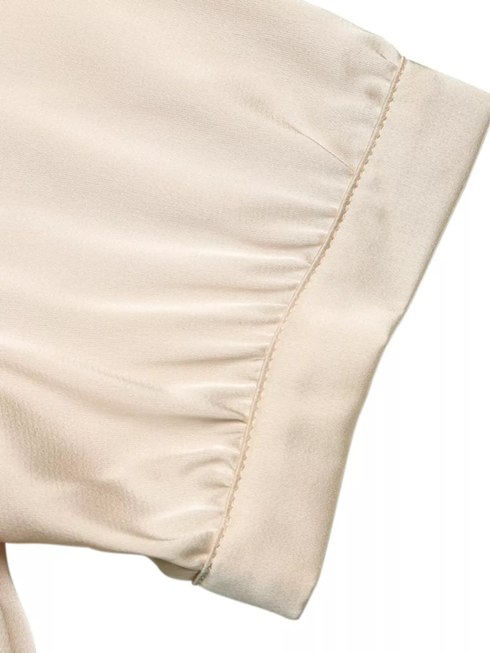 Pearl-trimmed satin bodysuit in cream with ruched sleeve detail