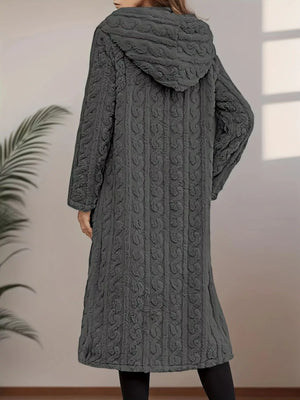 Gray hooded longline overcoat with textured pattern and button closure.