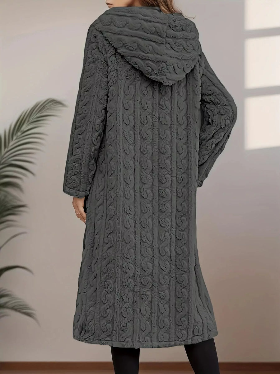 Gray hooded longline overcoat with textured pattern and button closure.