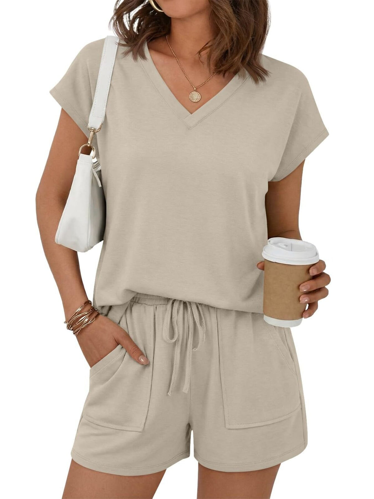 V-neck top and drawstring shorts set in apricot with pockets and a relaxed fit.