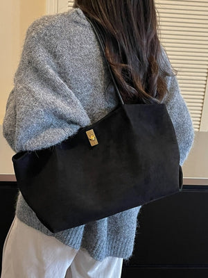 Turn-Lock Suede Tote Bag in black with turn-lock closure