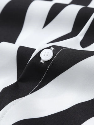 Black and white striped shirt with a white button detail