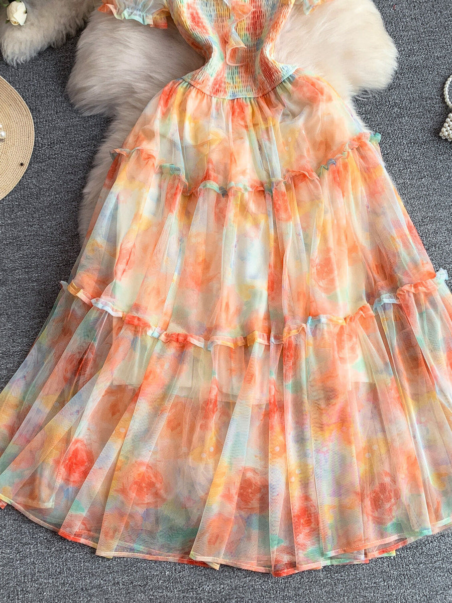 Tiered mesh maxi dress with floral print and ruffled trim