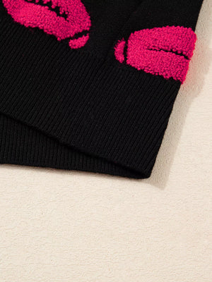 Black knit short-sleeve sweater with textured pink lips pattern