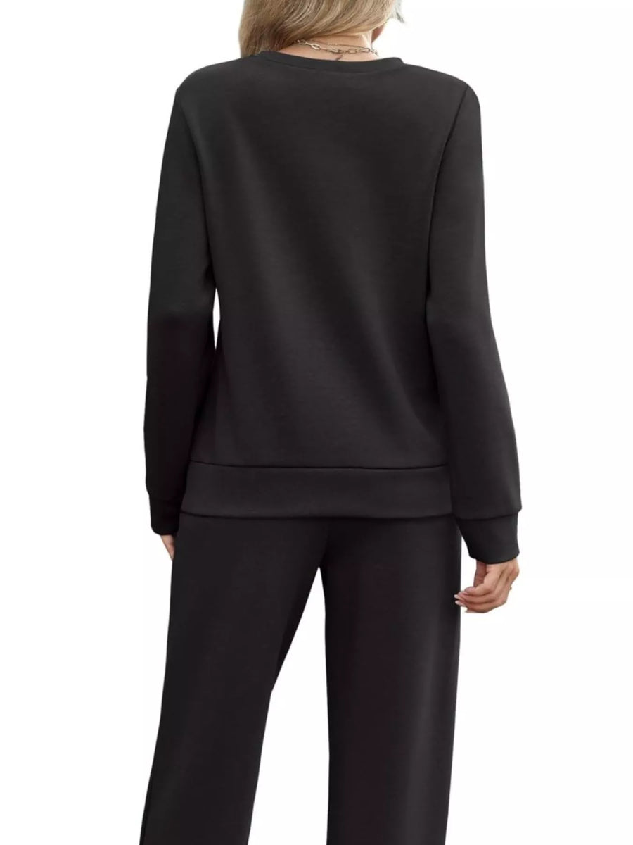 Black casual long-sleeve top and pants set with drawstring detail.