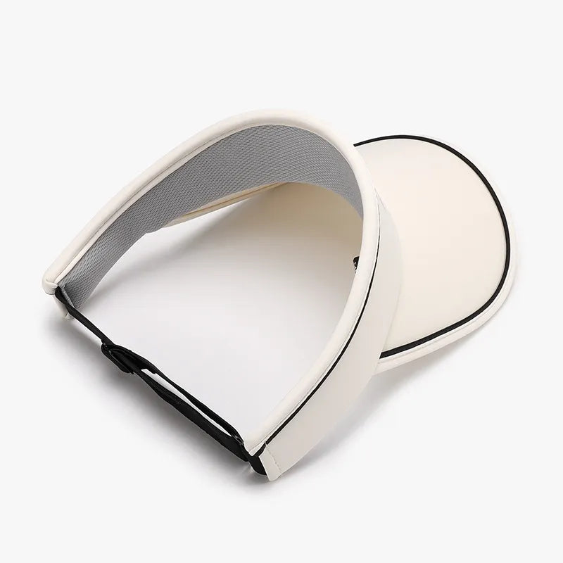 Ivory textured visor with black contrast piping and adjustable strap