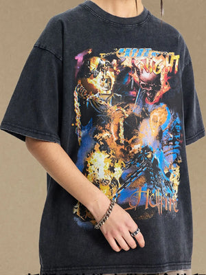 Black vintage graphic tee with oversized fit and fiery skull artwork.
