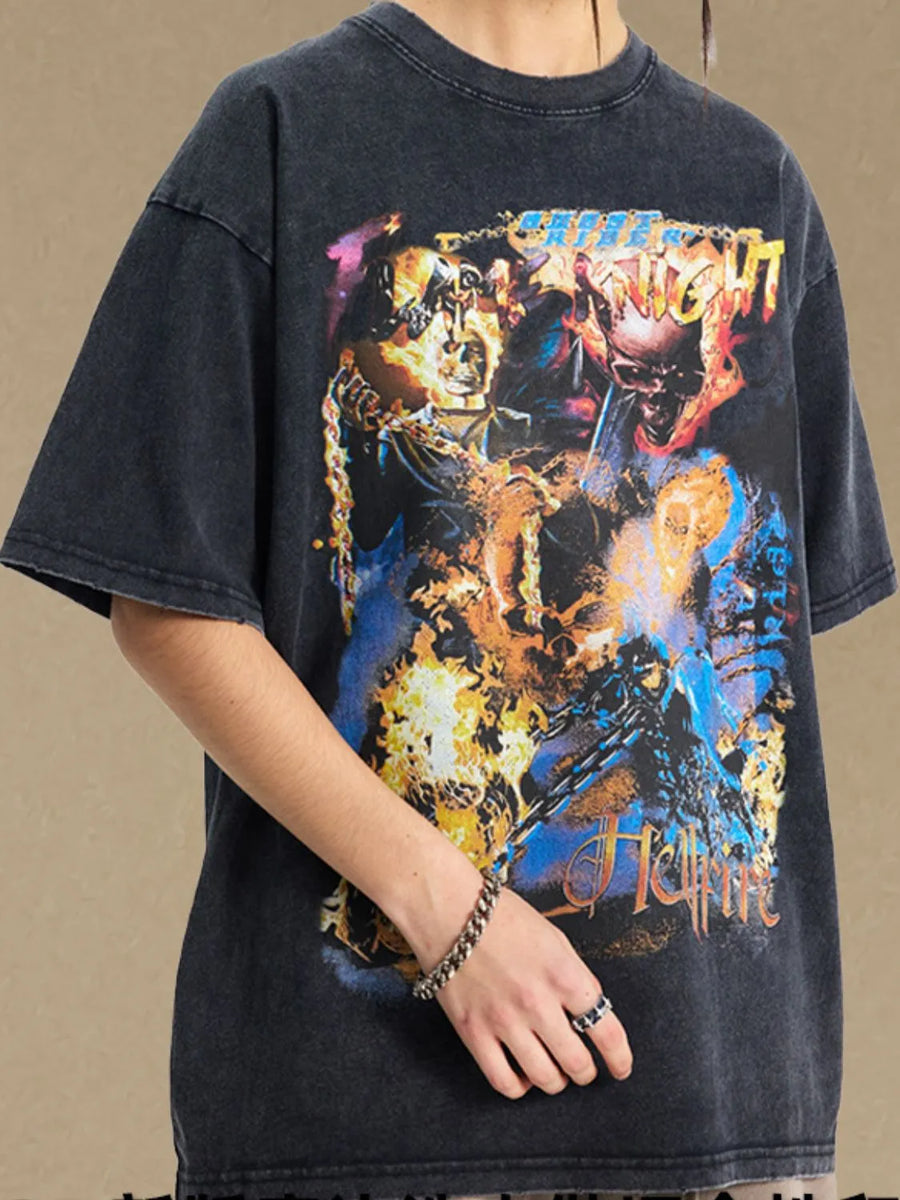 Black vintage graphic tee with oversized fit and fiery skull artwork.