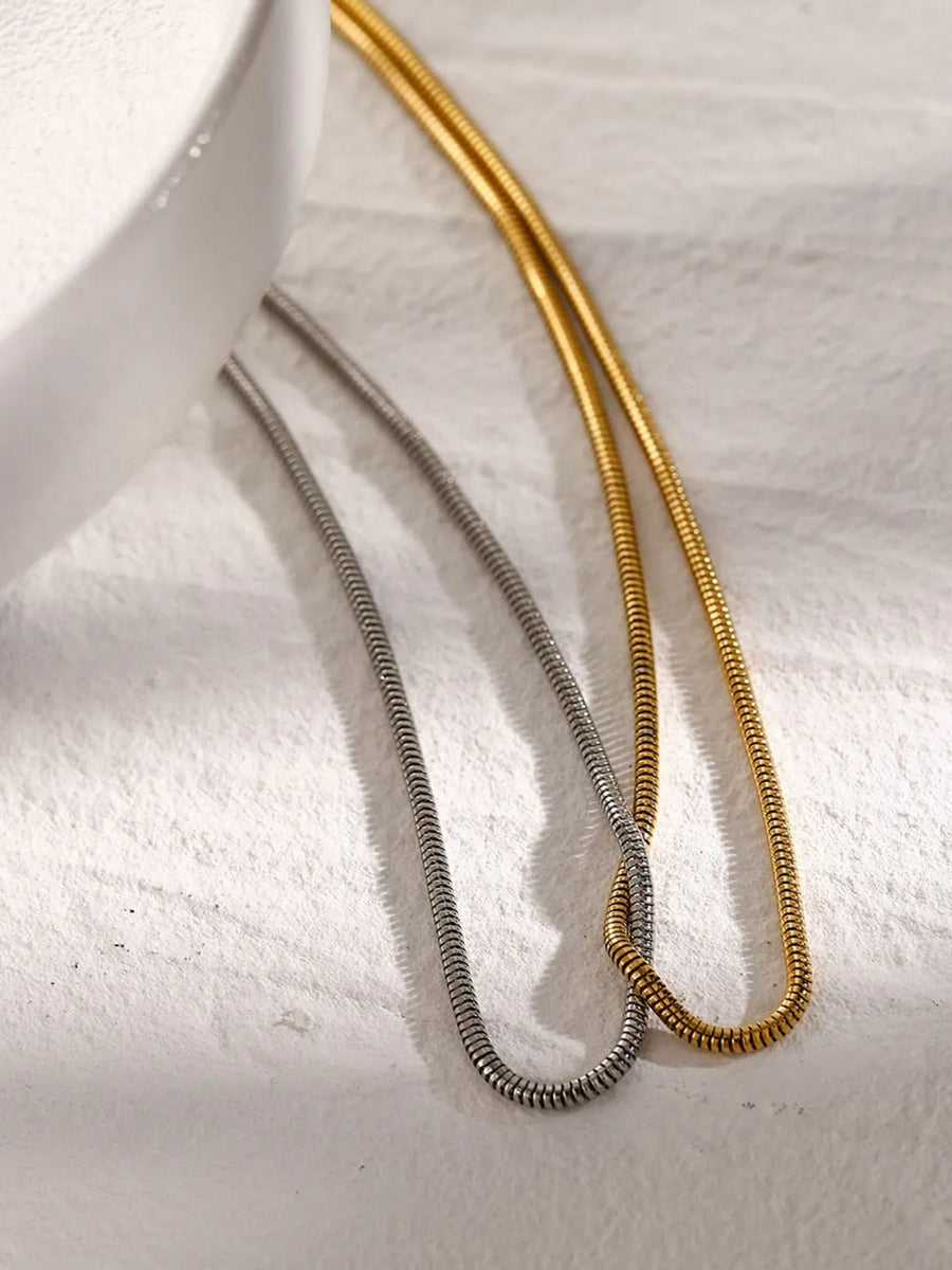 gold necklace with collar-length and clasp