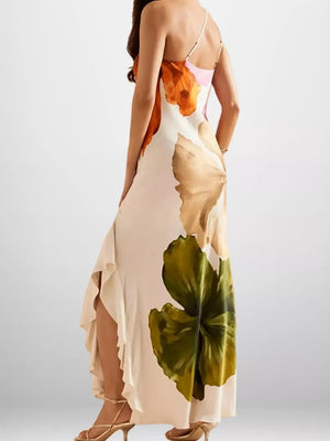 Maxi dress with floral print, one-shoulder neckline, and high slit.