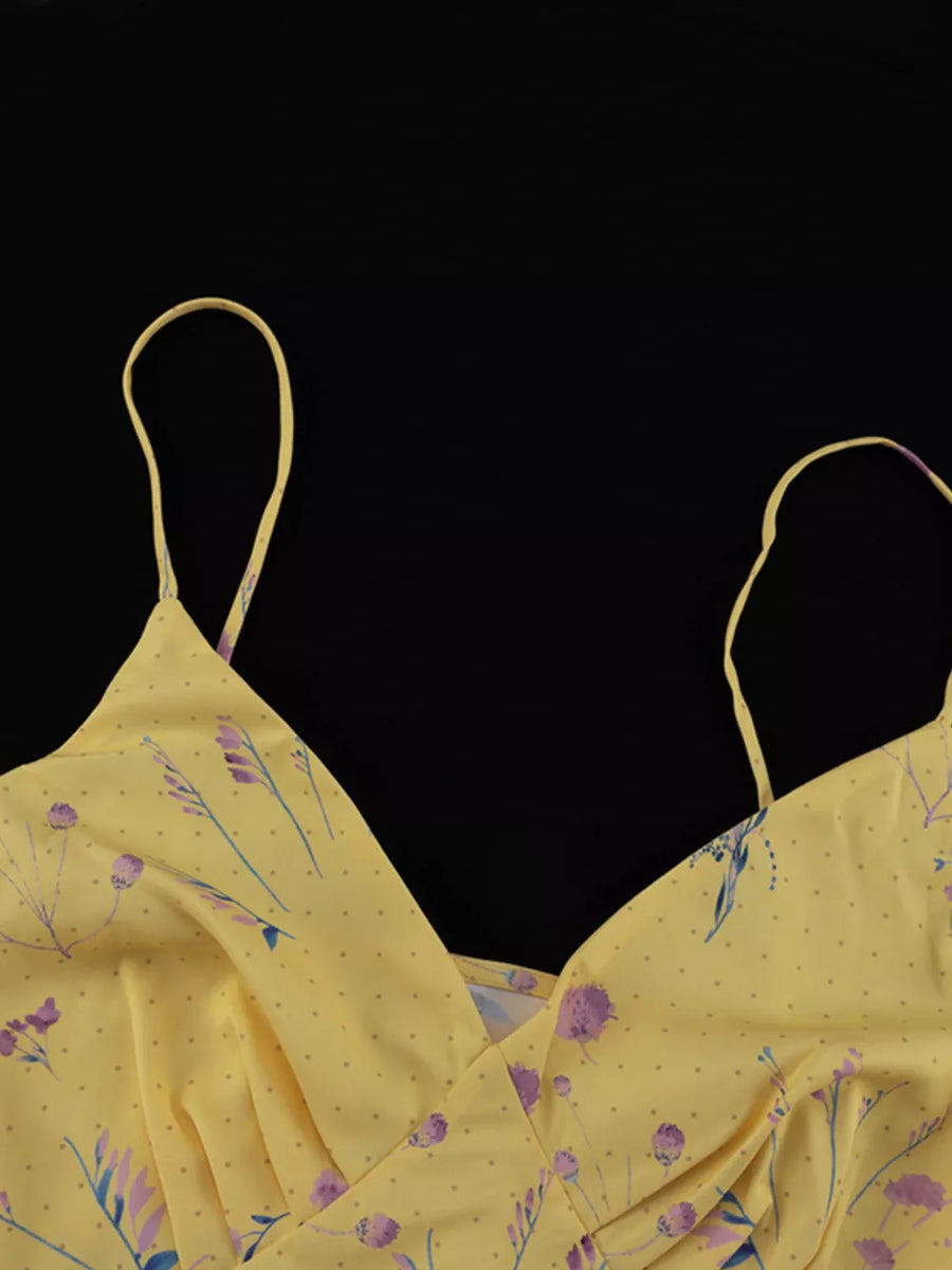 Yellow floral print cami dress with spaghetti straps and v-neckline