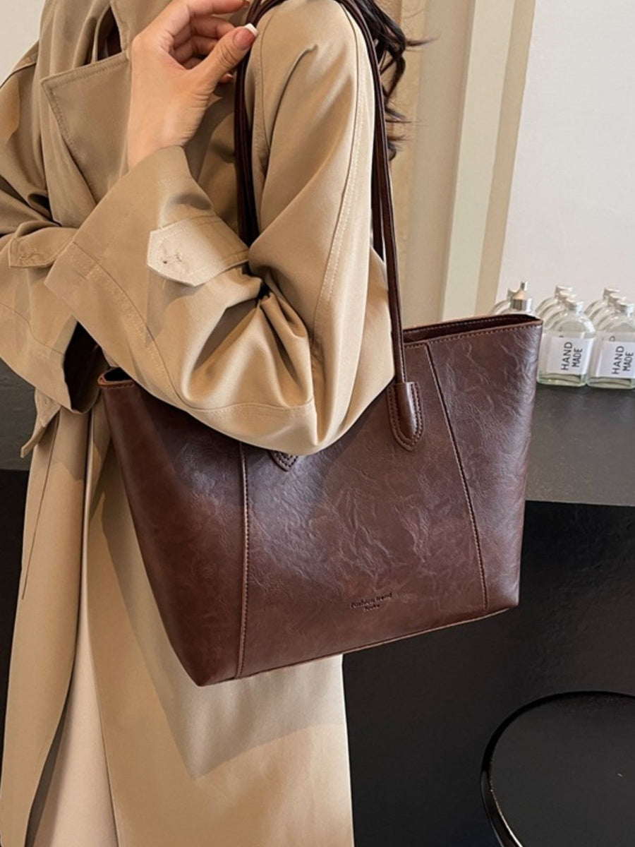 Premium crinkled pu leather tote bag in coffee brown with a textured finish.