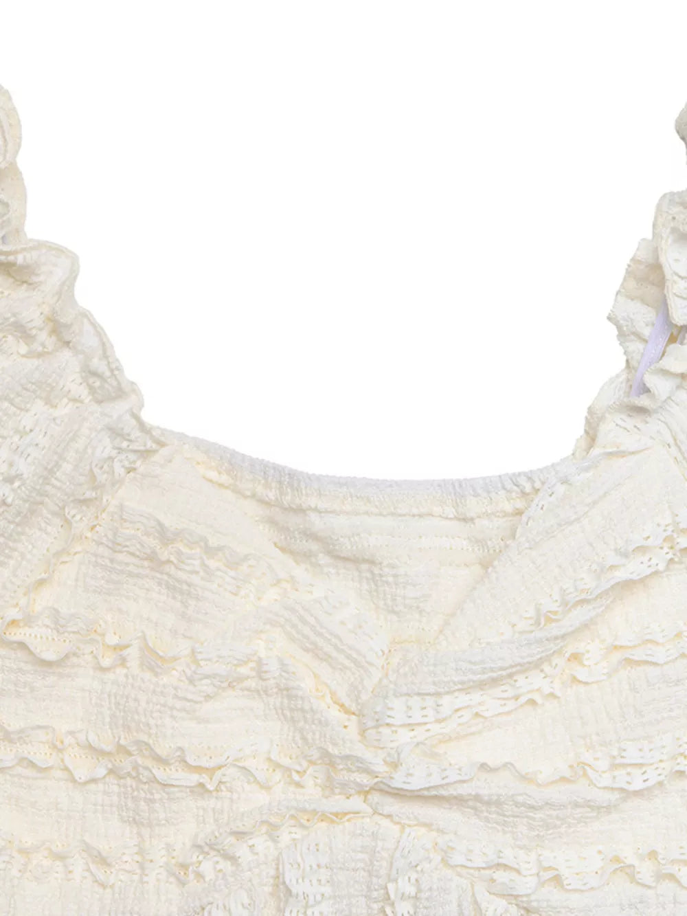 Cream textured maternity t-shirt with ruched front and ruffled neckline.