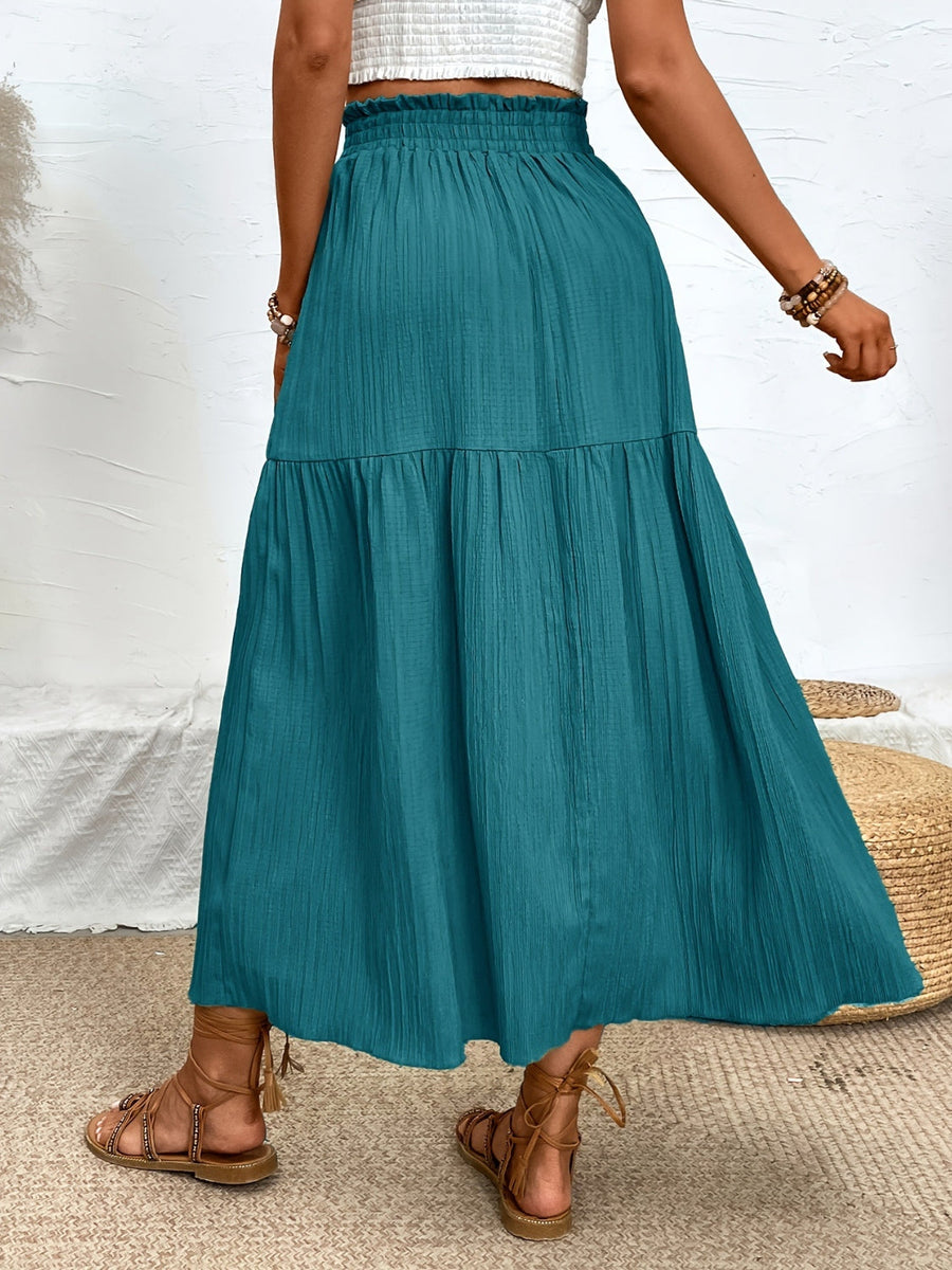 Textured tiered maxi skirt in French Blue with elastic waist and ruffled hem.