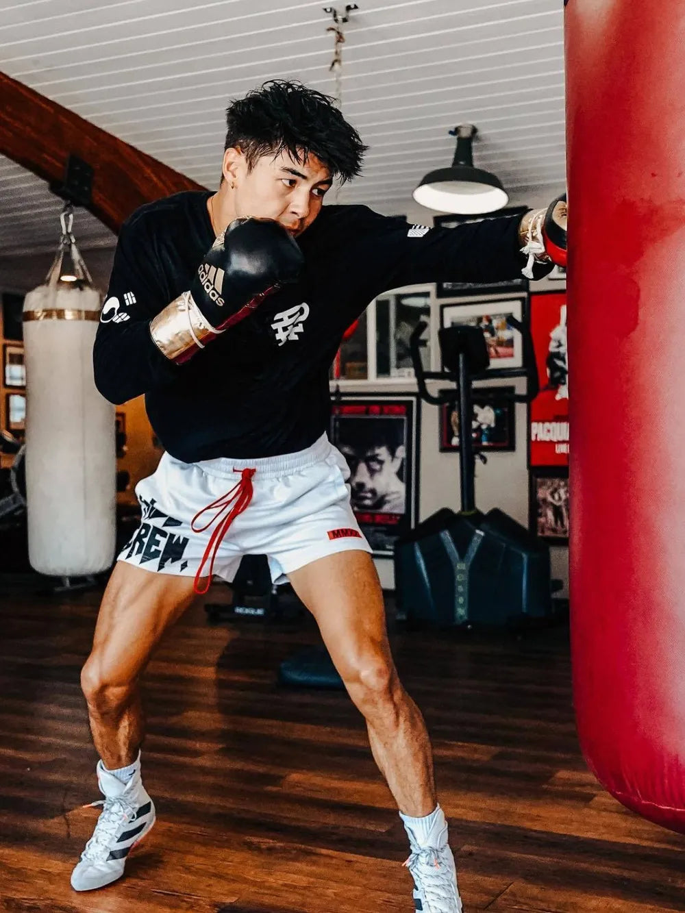 Kill Crew graphic training shorts in white with red drawstring, worn by a boxer.