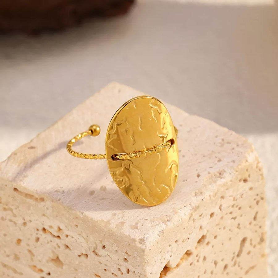 ring featuring hammered texture in gold with 18K Gold-Plated, Stainless Steel Care instructions: Avoid wearing during