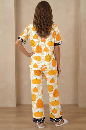 pajama set in orange with novelty print and buttoned