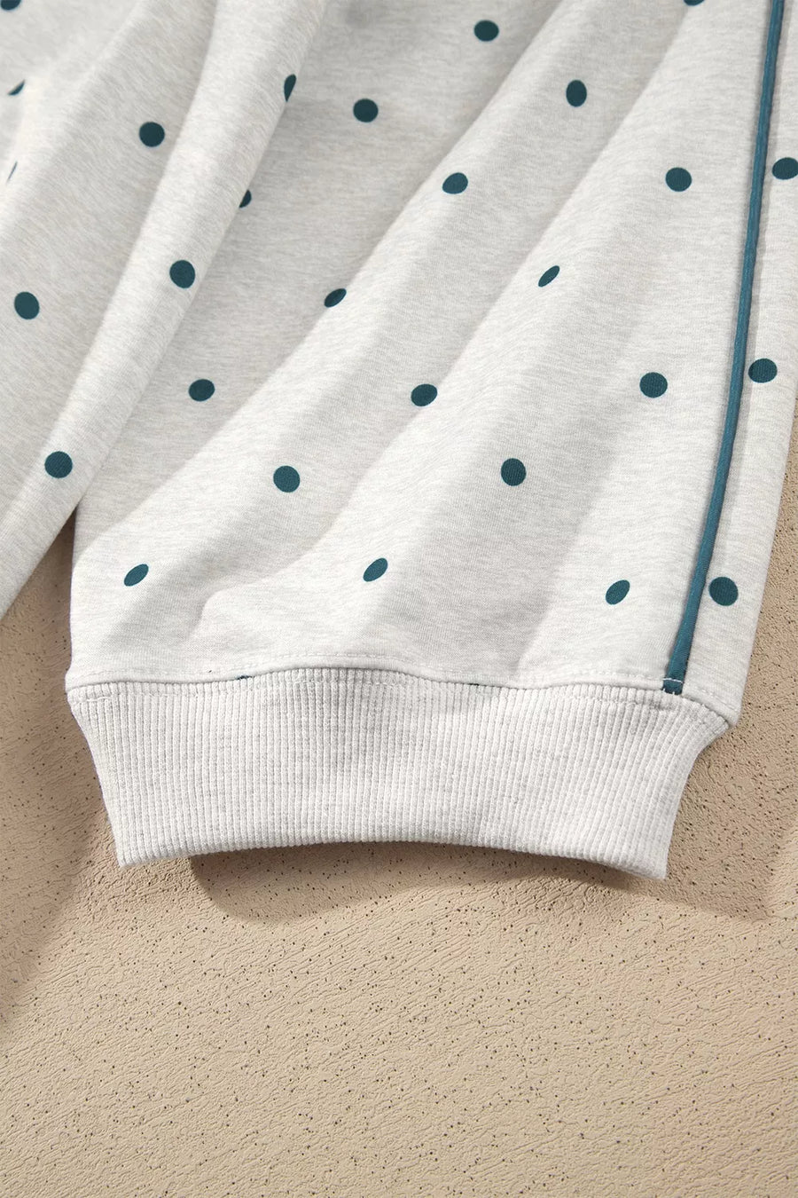 pullover sweater featuring polka dot in slate blue with 100% polyester Care instructions: Machine wash cold texture