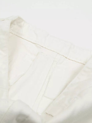 White maternity capris with wide legs and a comfortable waistband detail.