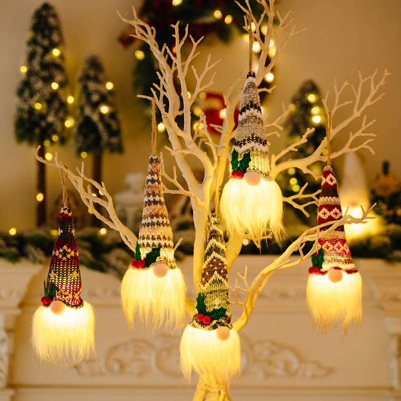Illuminated gnome ornaments with patterned hats and glowing white beards, available in multiple styles.