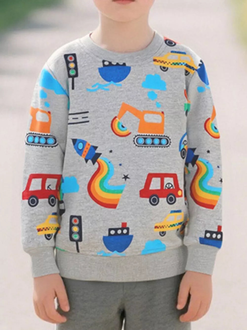 Toddler grey cotton crew neck sweatshirt with playful transportation all-over print.