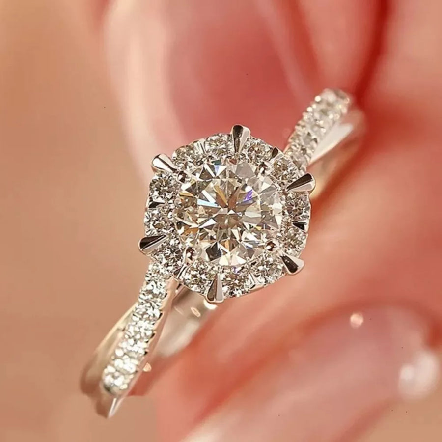 925 sterling silver,Moissanite Carat weight: 2ct Care instructions: Avoid wearin ring in clear with fitted silhouette