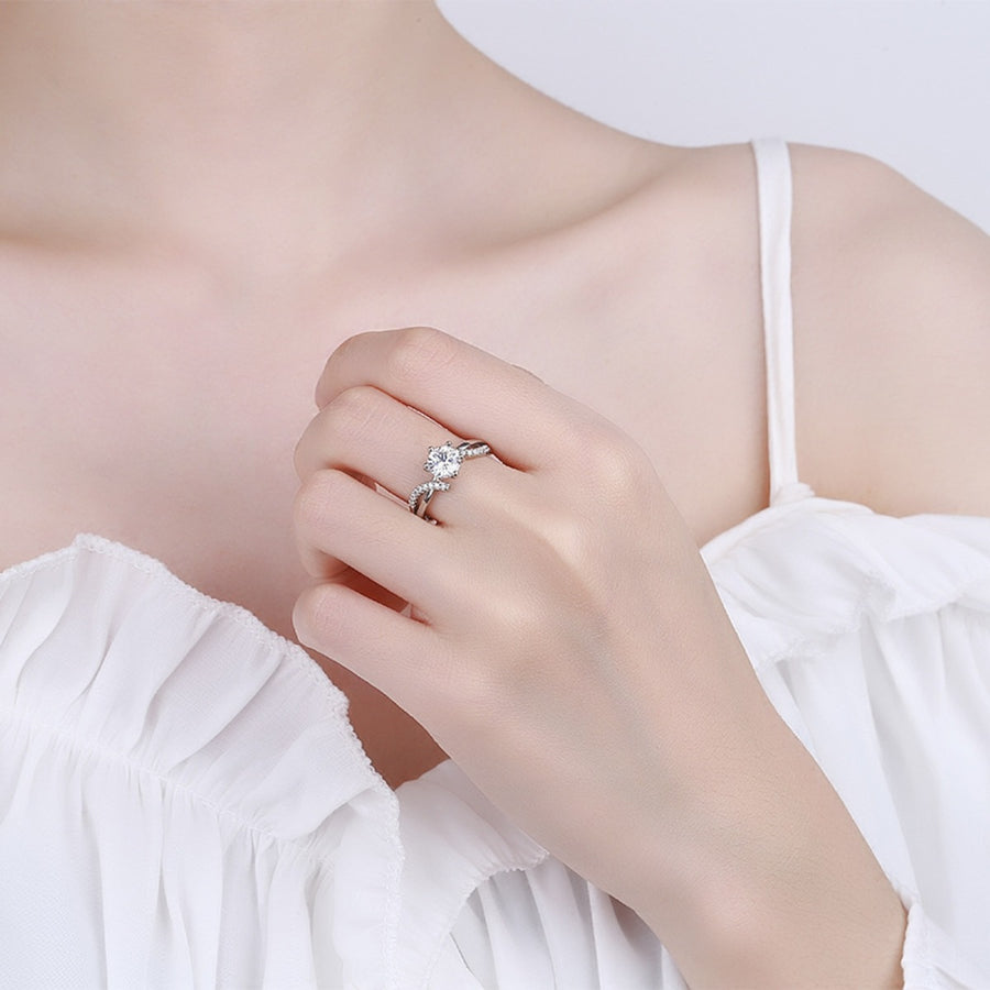 925 sterling silver,Moissanite Carat weight: 1ct Care instructions: Avoid wearin ring in clear with n/a silhouette