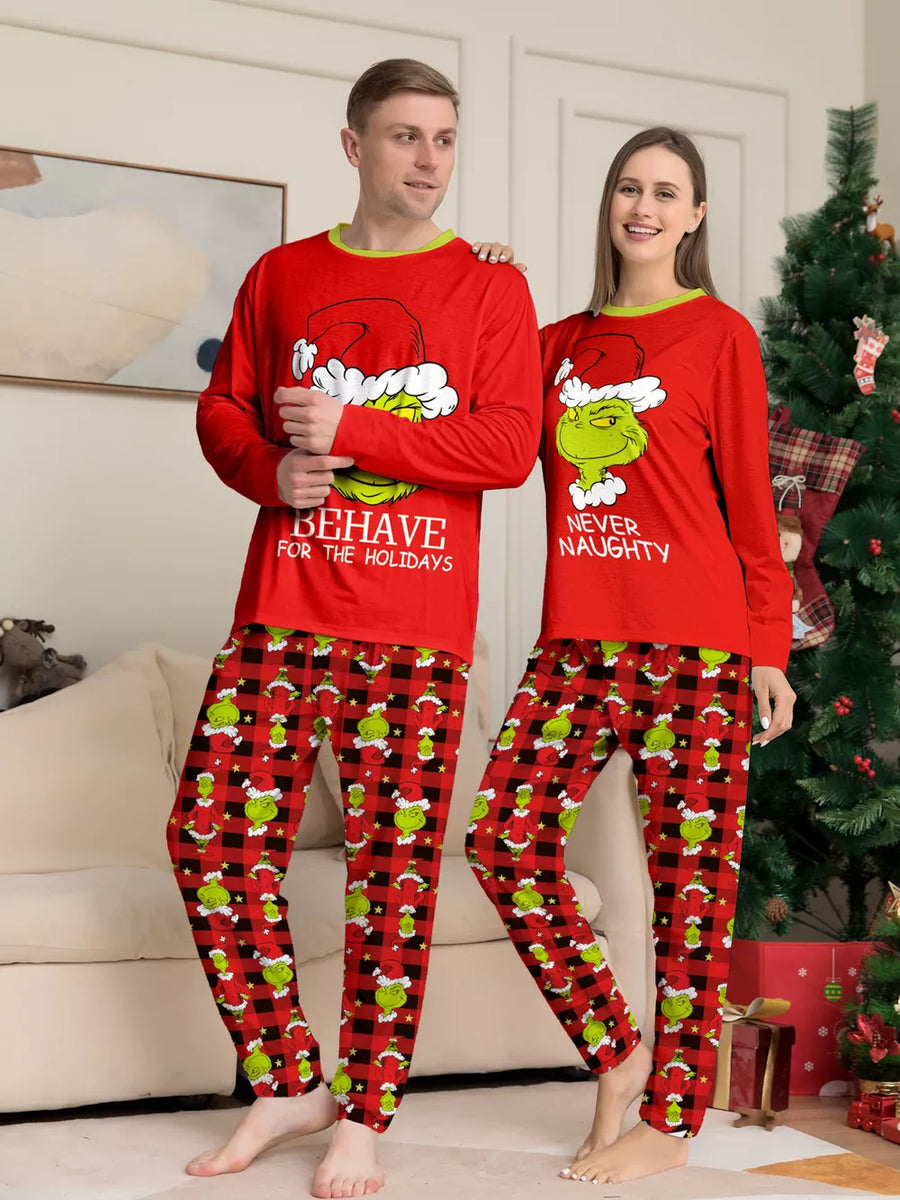 black pajama set featuring long sleeve and graphic print, plaid
