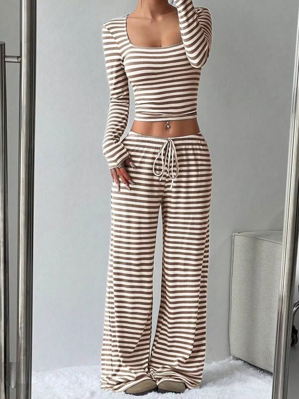 Striped crop top and wide-leg pants loungewear set with drawstring waist.