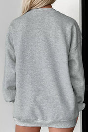 sweatshirt in orange with floral and graphic print