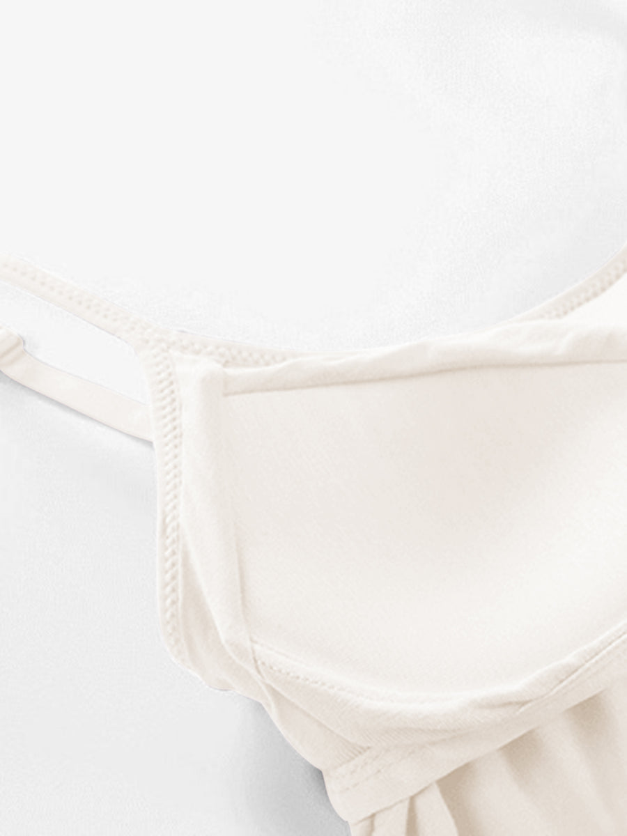 Ivory soft-cup cami with adjustable straps and a seamless neckline.