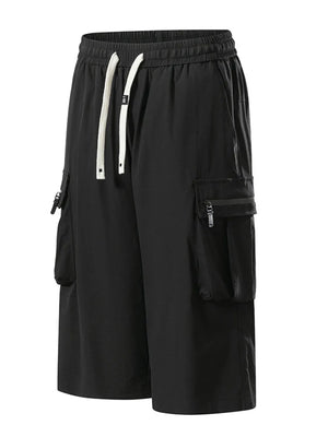 Black cargo shorts with drawstring waist and zippered pockets